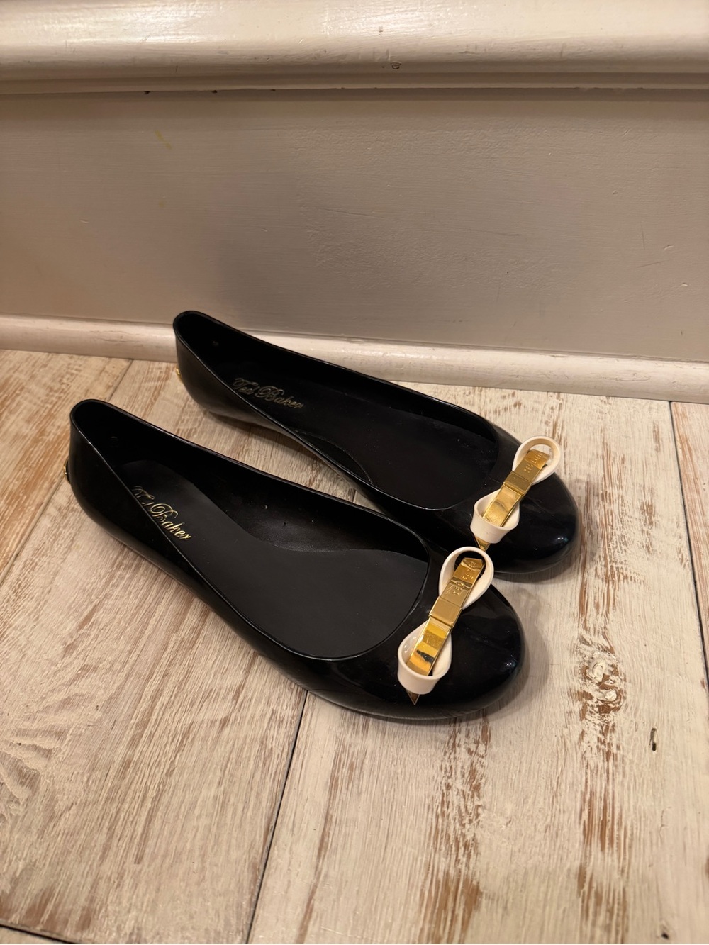 Ted baker Black Patent Flats with White and Gold Bow Accent